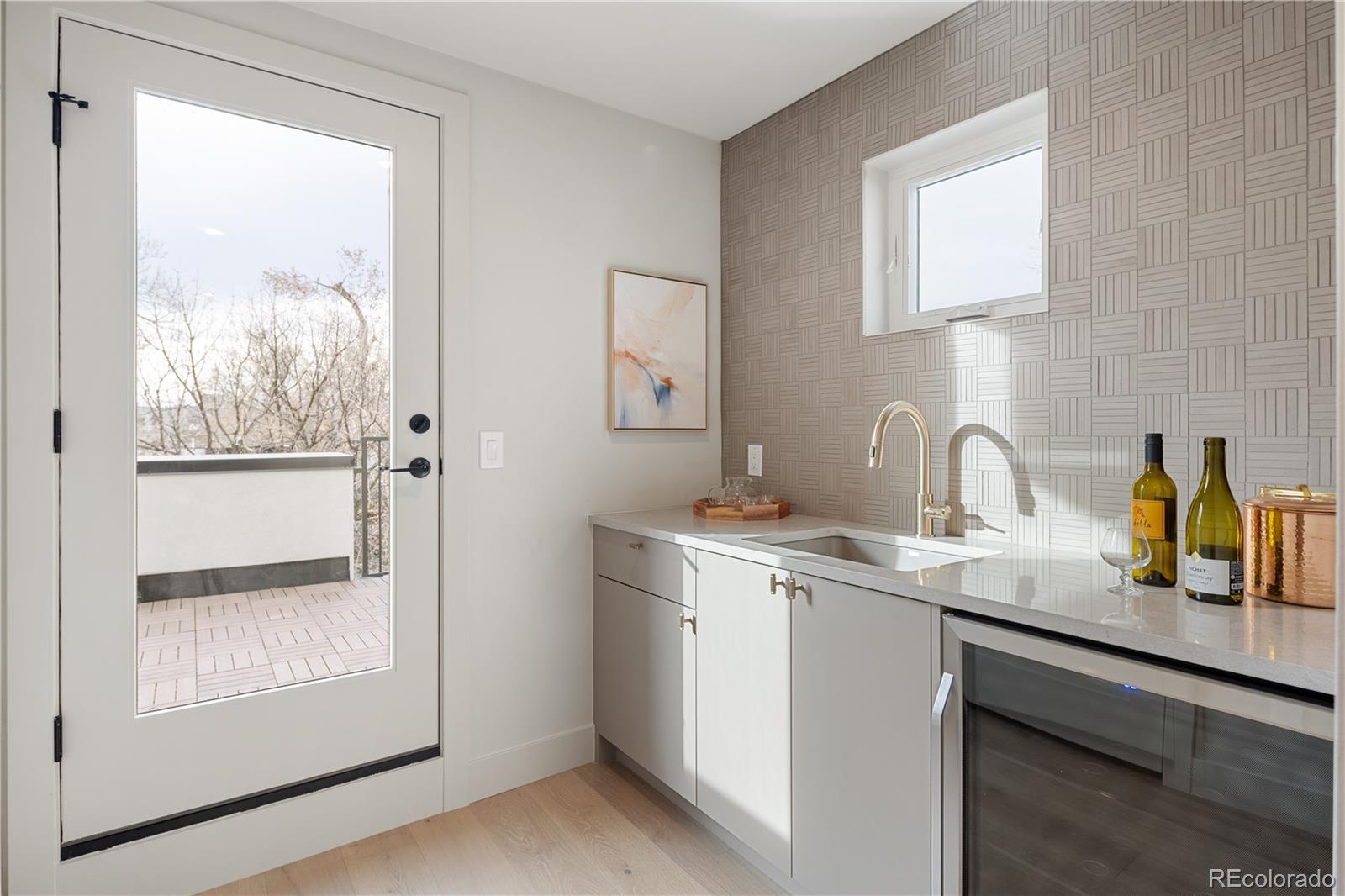 4572 North Raleigh Street Denver, CO 80212 - Photo 34 of 50 a kitchen with a sink and a window