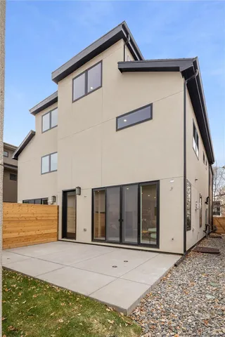 a view of outdoor space with garden and wooden fence
