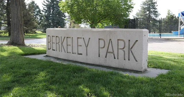 a view of a backyard with sitting area