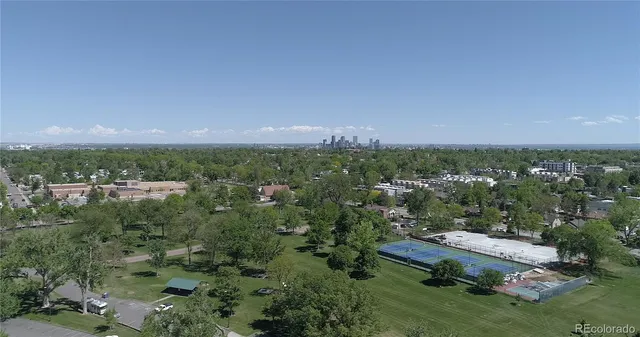 a group of cars parked in front of building