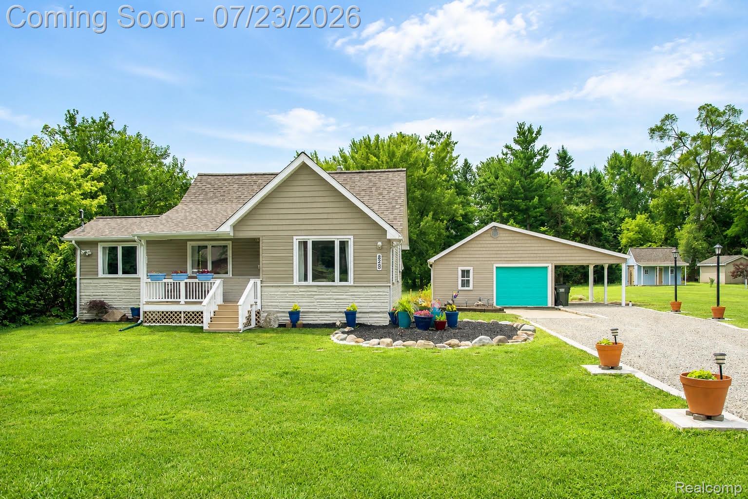 829 Francis Street Rochester, MI 48307 - Photo 1 of 25 Single-story residence featuring light-toned siding and a prominent gable roof