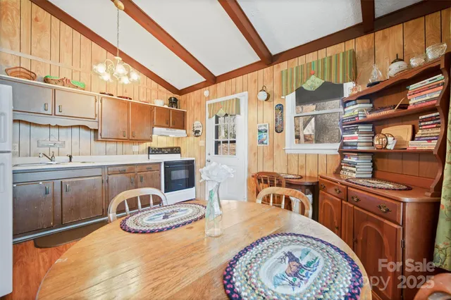 a bedroom with a bed and a table in it