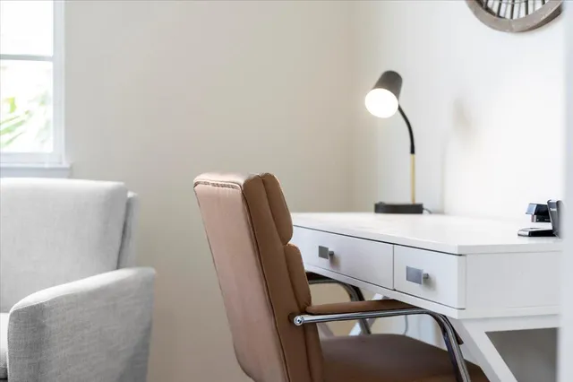 a room with furniture and window