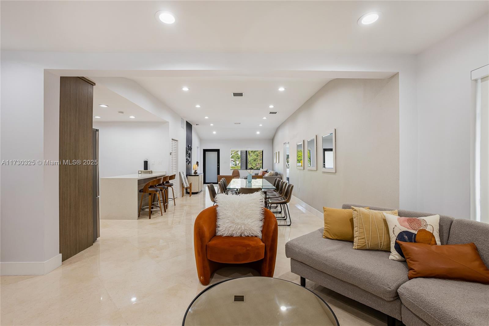 320 Southwest 19th Road Miami, FL 33129 - Photo 14 of 72 a living room with furniture and a table