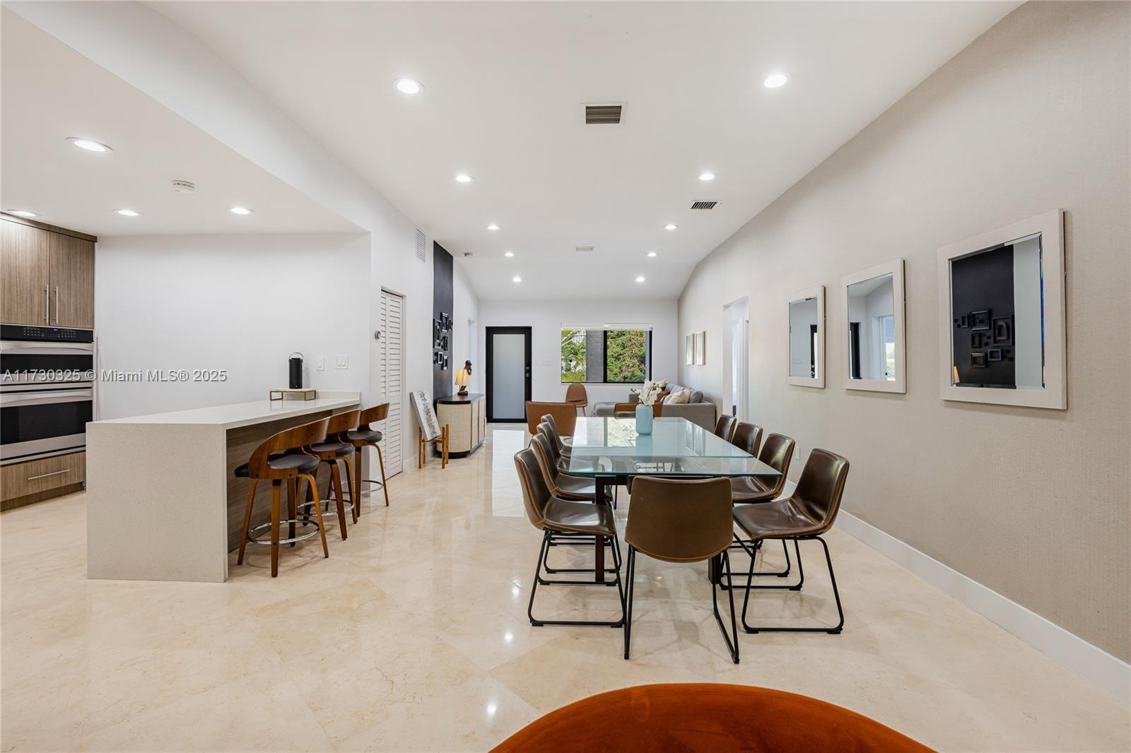 320 Southwest 19th Road Miami, FL 33129 - Photo 15 of 72 a view of a dining room with furniture