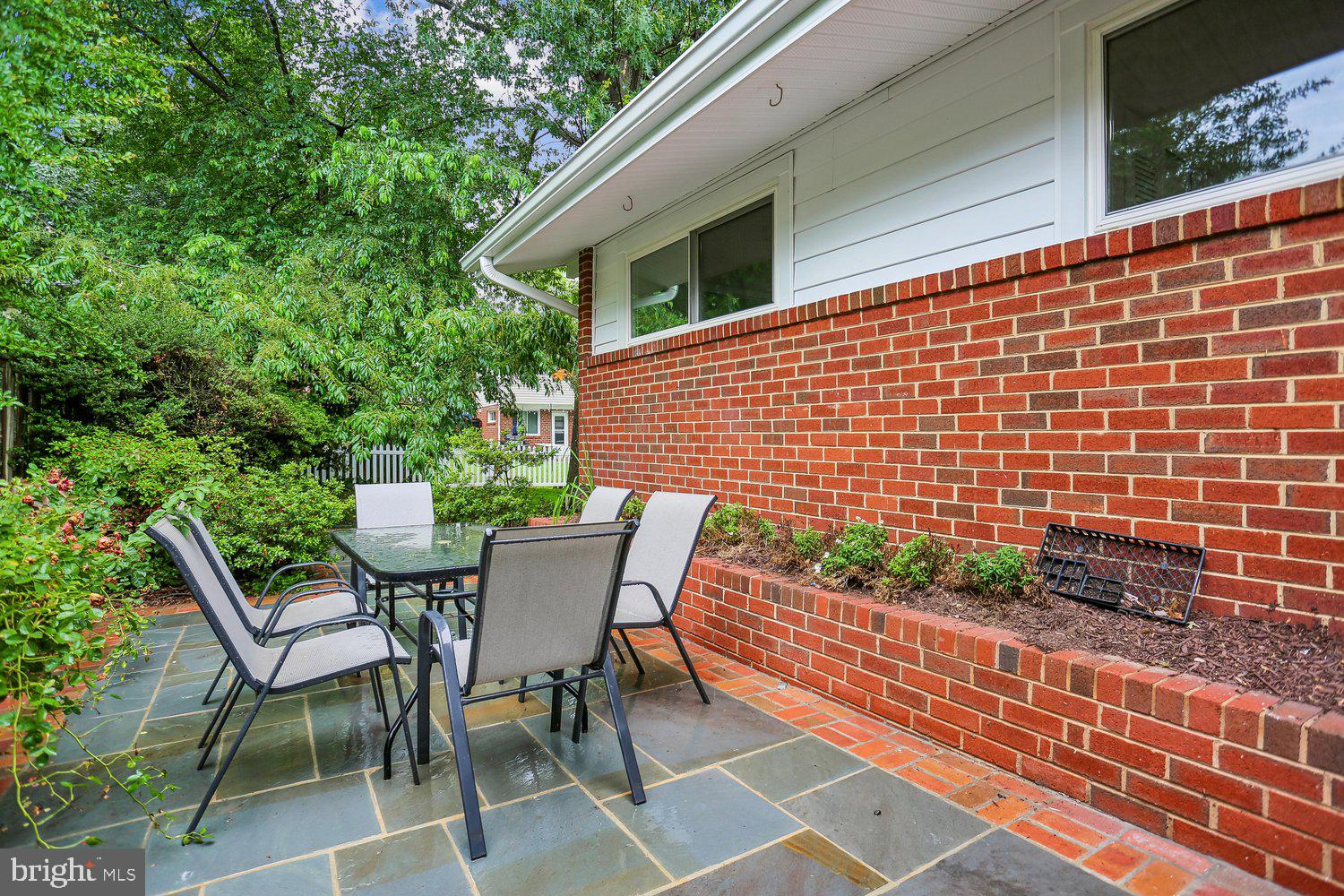 907 Hoyt Street Silver Spring, MD 20902 - Photo 59 of 69 a patio with table and chairs