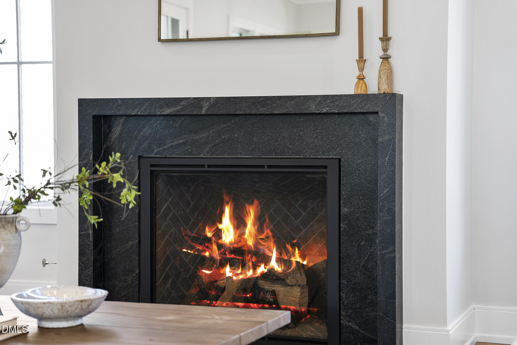 3416 Makers Circle Raleigh, NC 27612 - Photo 40 of 41 a room with a fireplace and a potted plant