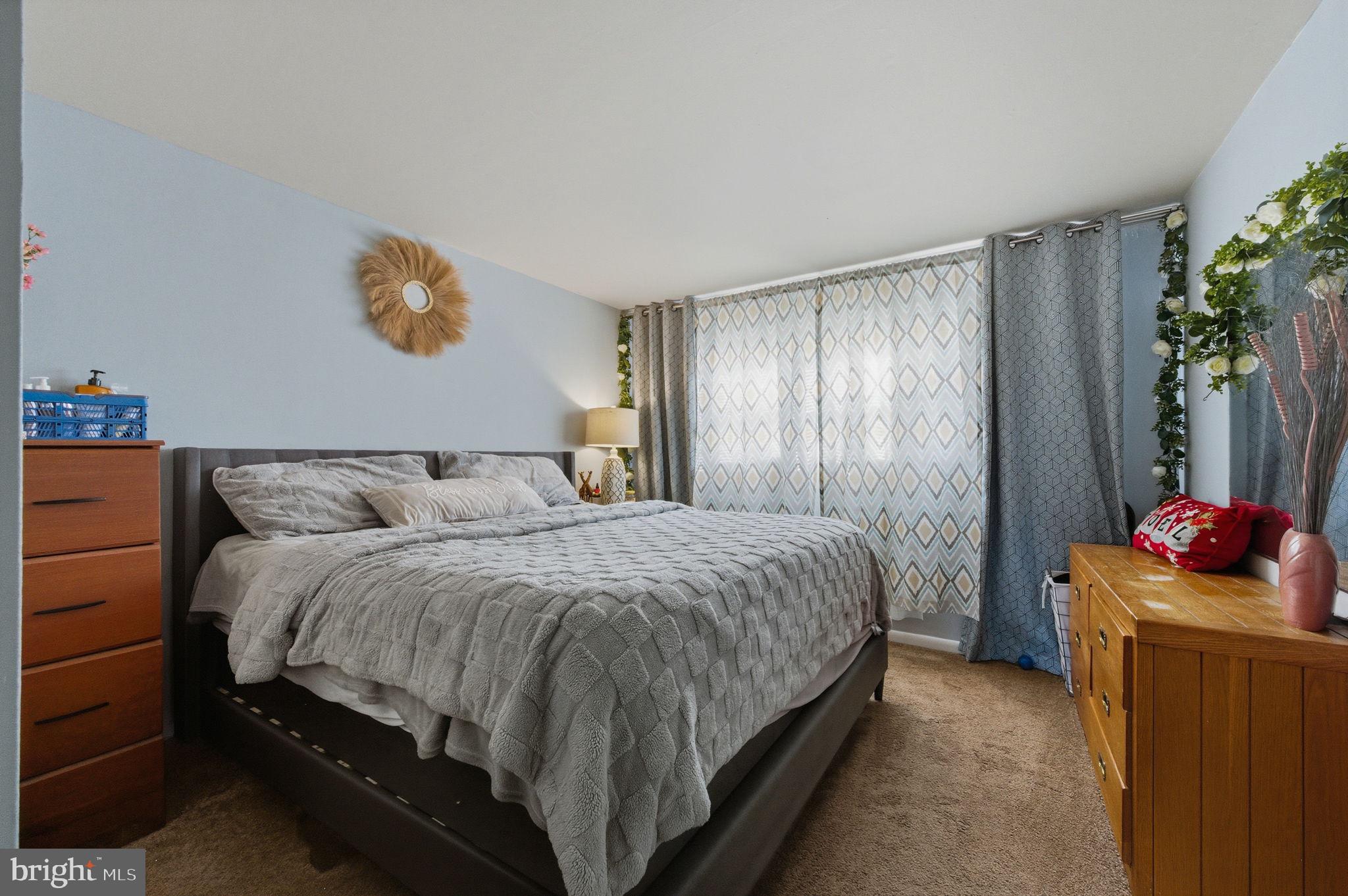 809 Bacon Avenue Dover, DE 19901 - Photo 17 of 27 a bedroom with a bed and a window