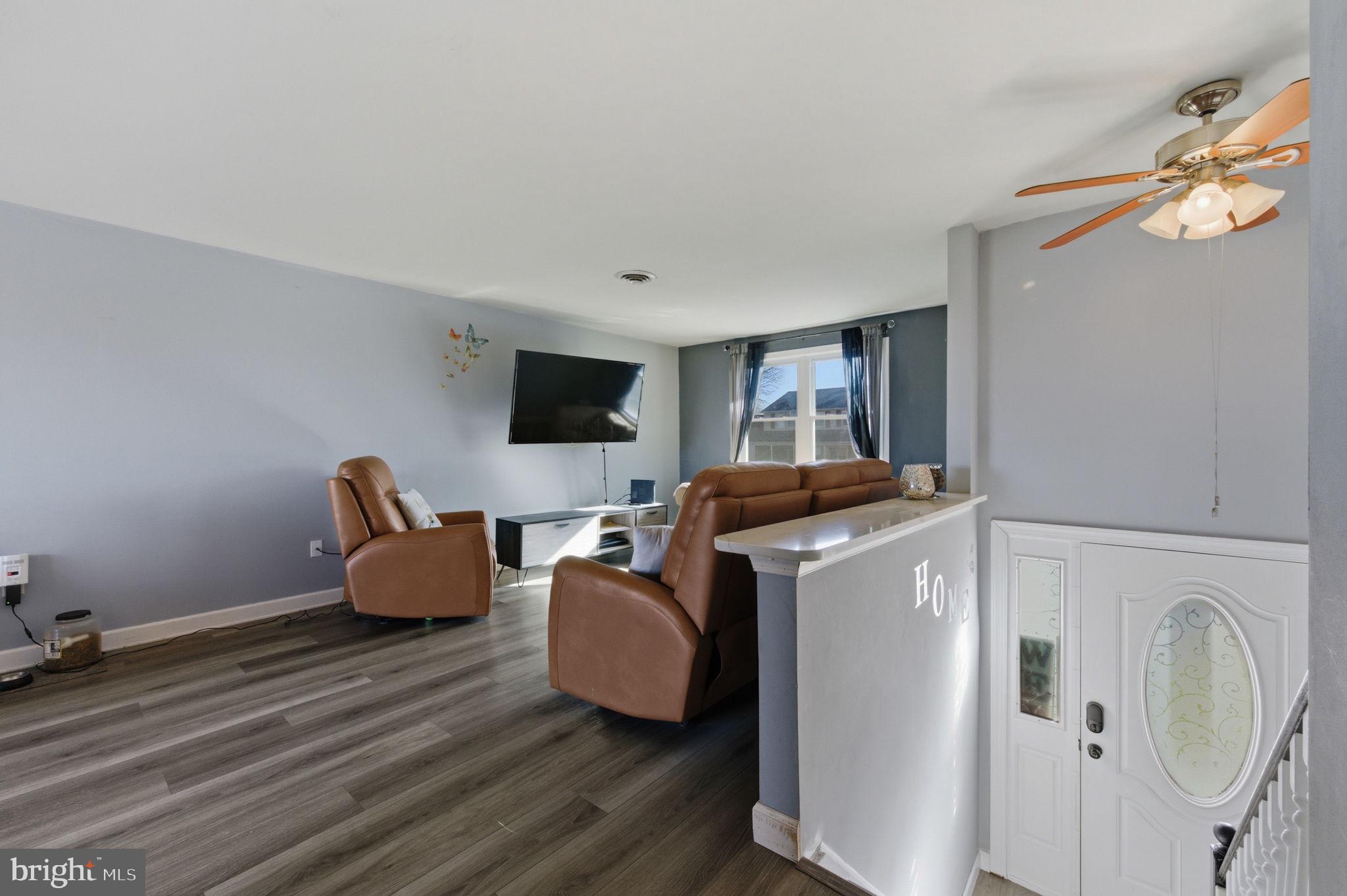 809 Bacon Avenue Dover, DE 19901 - Photo 2 of 27 a living room with furniture and a flat screen tv