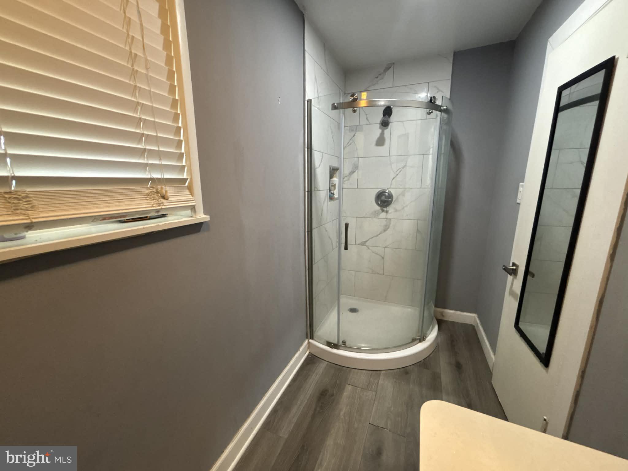 809 Bacon Avenue Dover, DE 19901 - Photo 22 of 27 a bathroom with a toilet and a shower