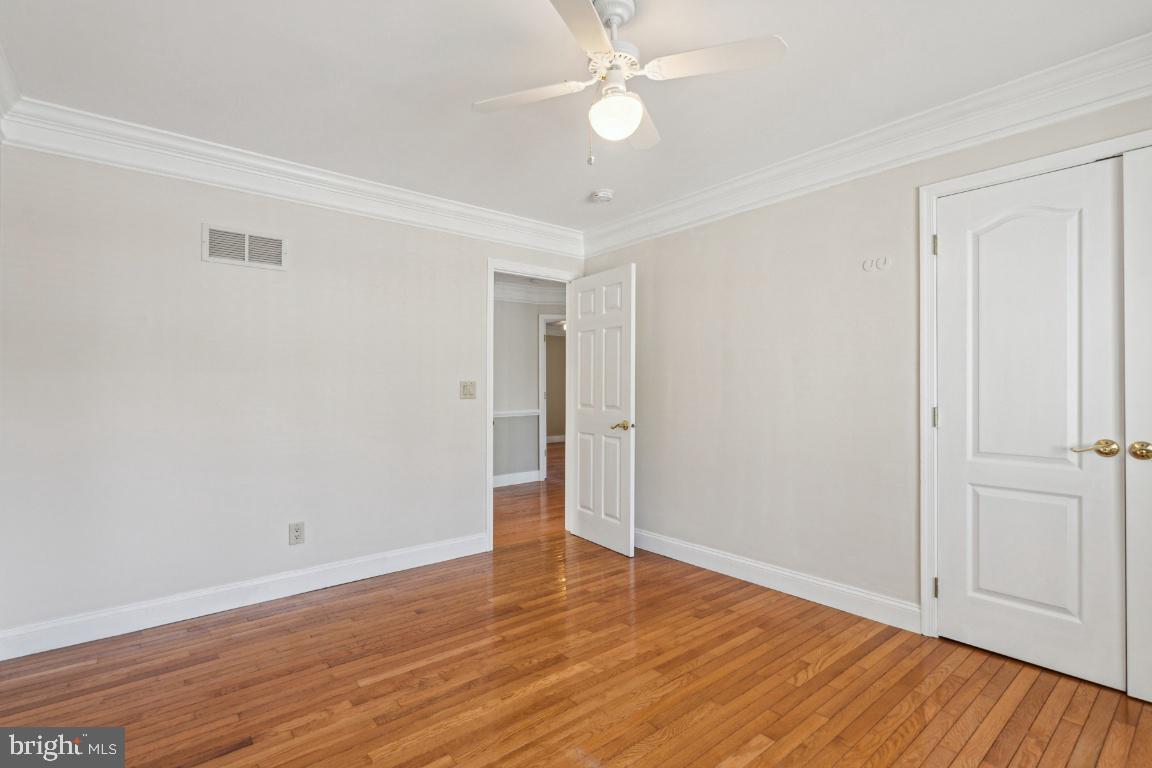 508 Weeks Avenue Riverside, NJ 08075 - Photo 8 of 26 a view of an empty room with wooden floor