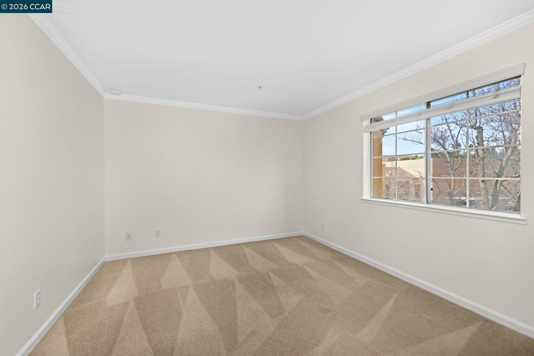 440 Bollinger Canyon Lane, Unit 396 San Ramon, CA 94582 - Photo 16 of 24 an empty room with a window