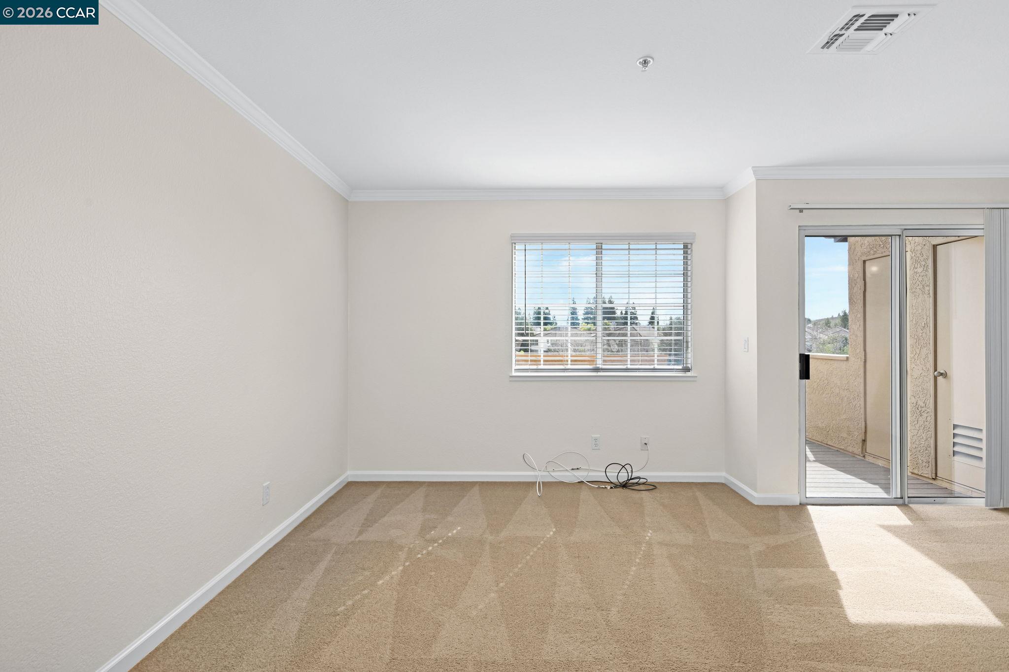 440 Bollinger Canyon Lane, Unit 396 San Ramon, CA 94582 - Photo 4 of 24 an empty room with windows