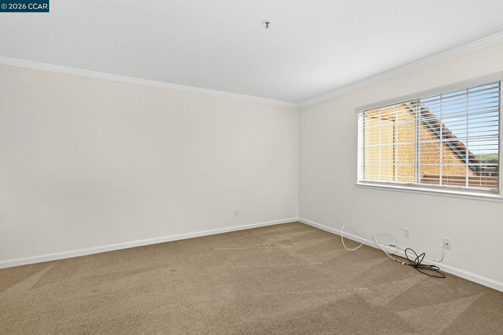 440 Bollinger Canyon Lane, Unit 396 San Ramon, CA 94582 - Photo 5 of 24 an empty room with a window