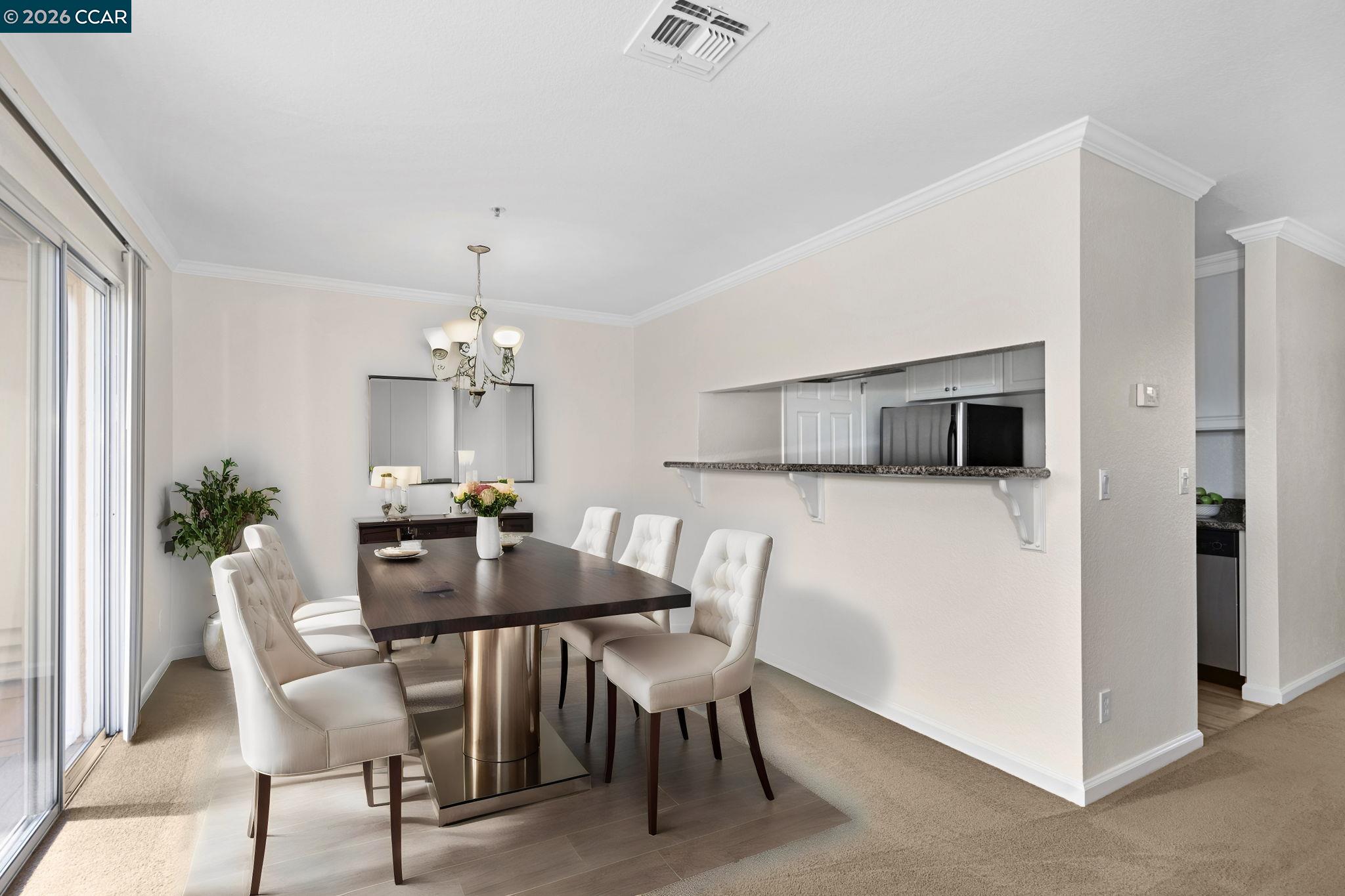 440 Bollinger Canyon Lane, Unit 396 San Ramon, CA 94582 - Photo 6 of 24 a view of a dining room with furniture and wooden floor