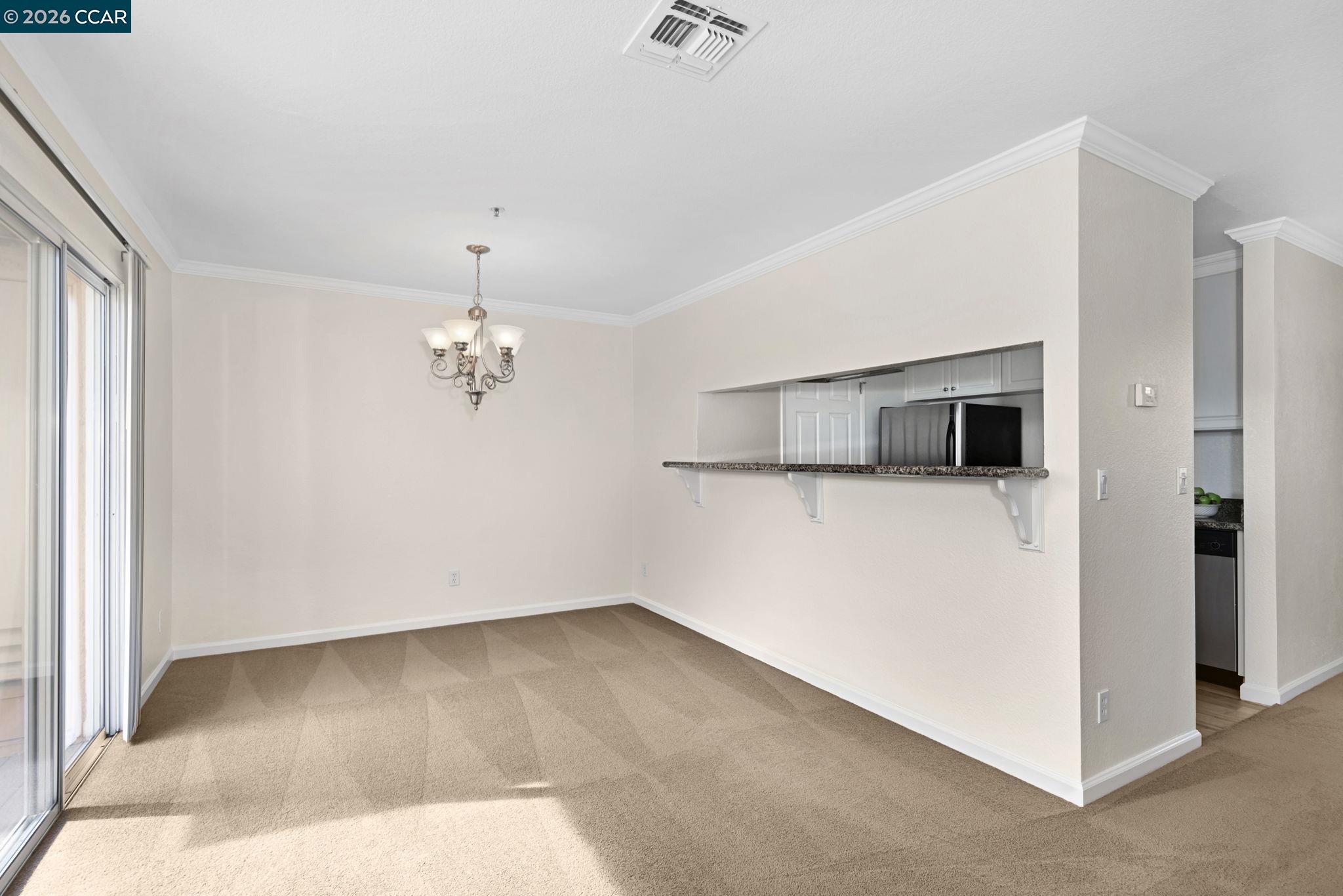 440 Bollinger Canyon Lane, Unit 396 San Ramon, CA 94582 - Photo 7 of 24 wooden floor in an empty room with a window