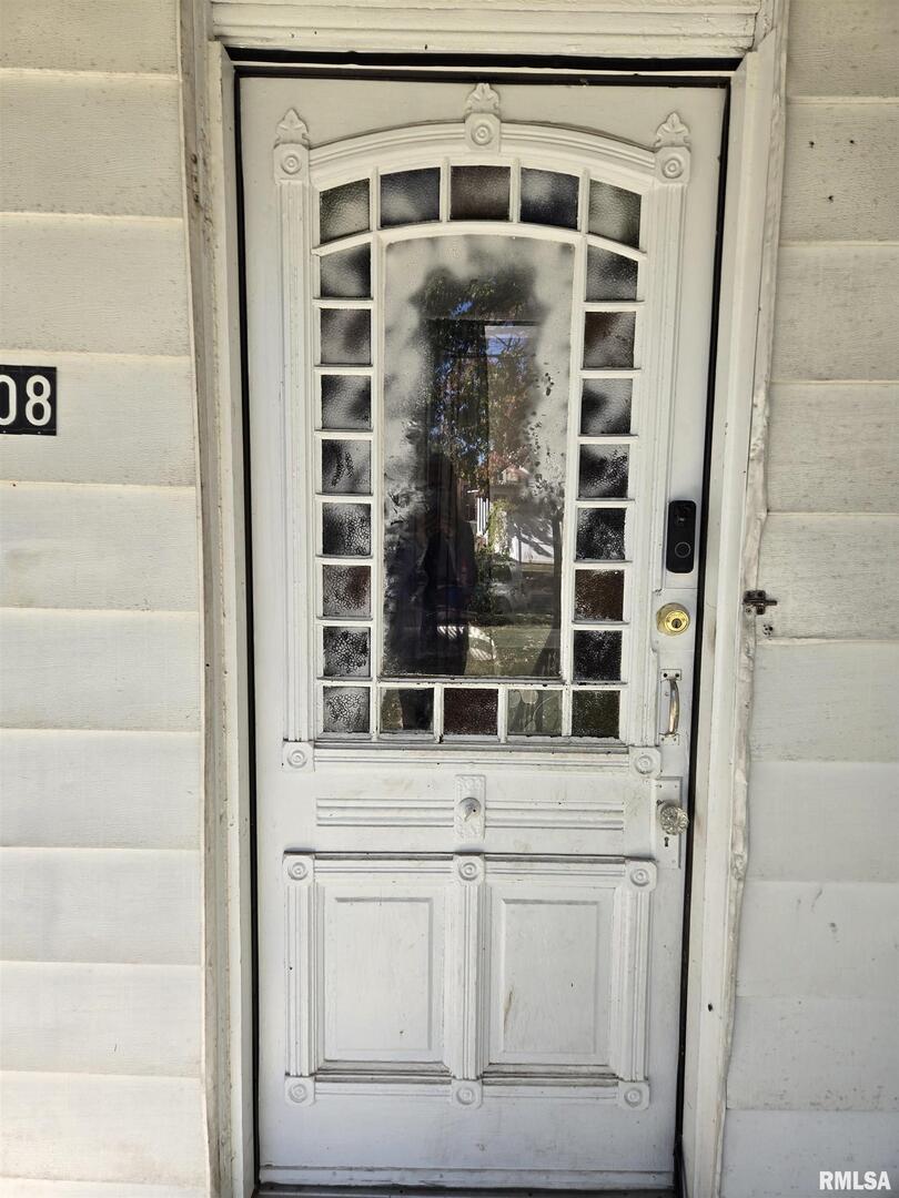 408 North Springer Street, Unit 2 Carbondale, IL 62901 - Photo 9 of 15 a bathroom with a shower and a mirror