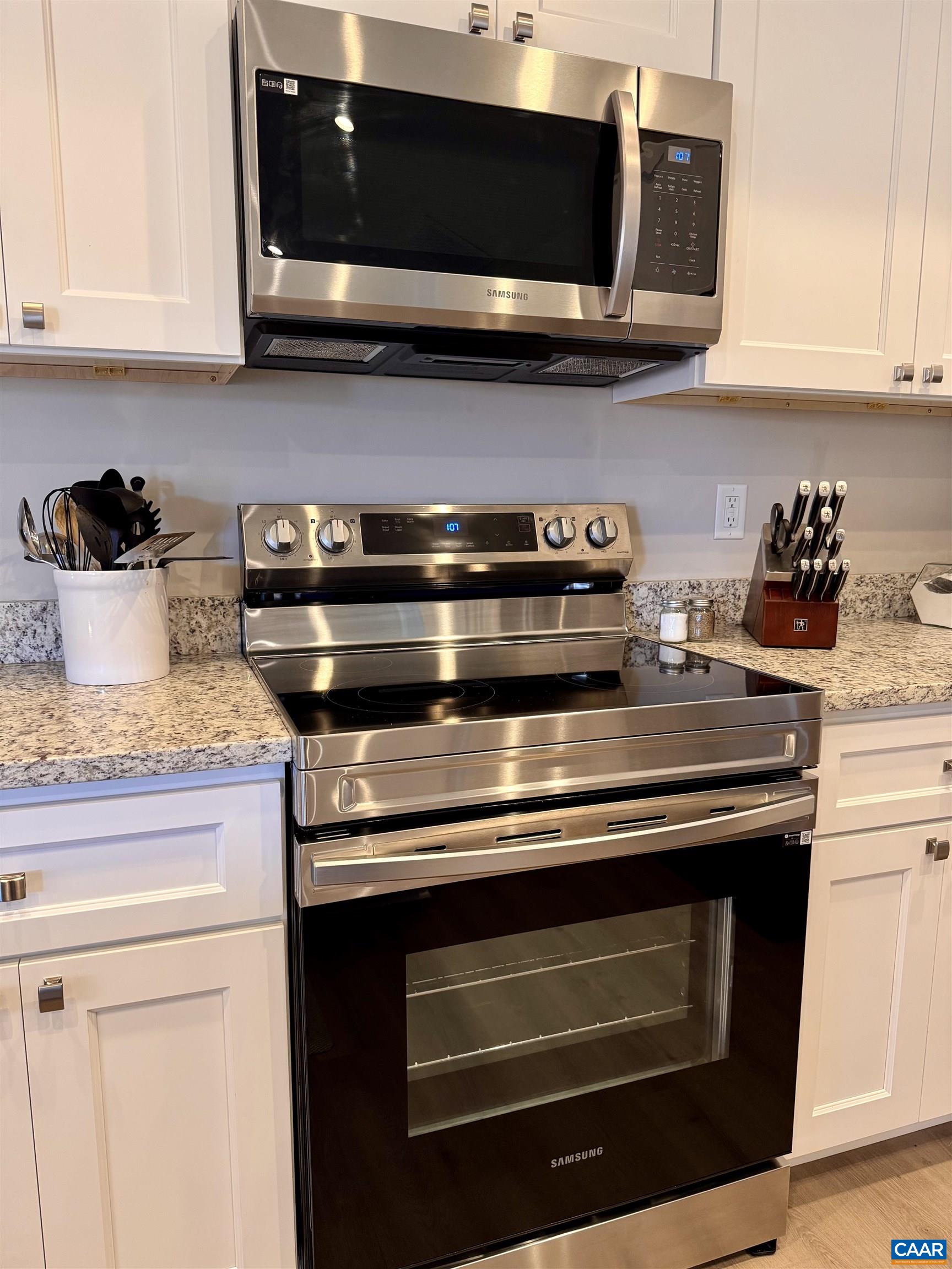 201 Spring Run Lane Waynesboro, VA 22980 - Photo 11 of 29 a kitchen with a stove and a microwave
