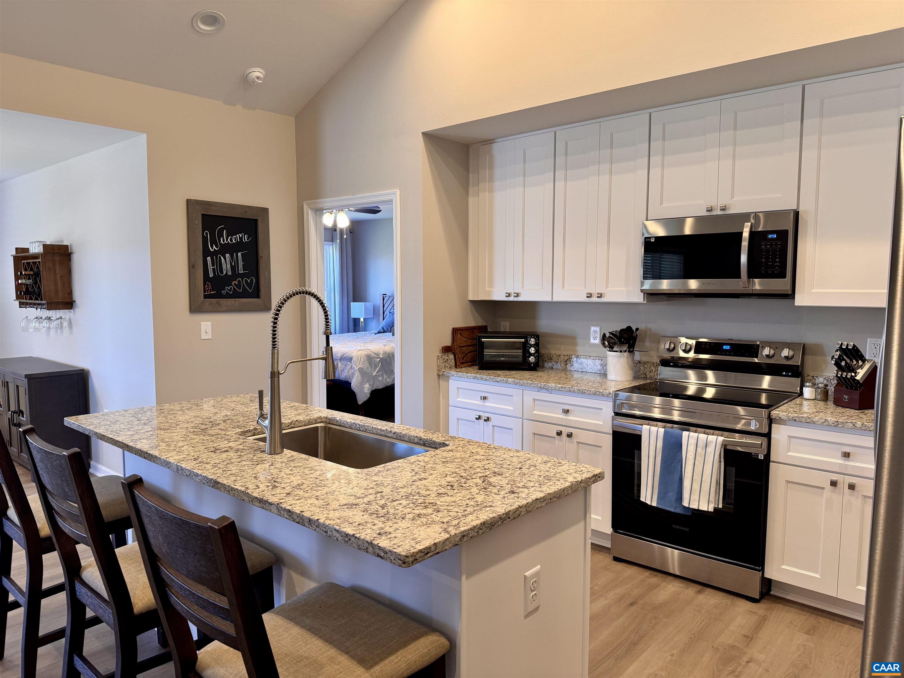 201 Spring Run Lane Waynesboro, VA 22980 - Photo 13 of 29 a kitchen with granite countertop a sink and appliances