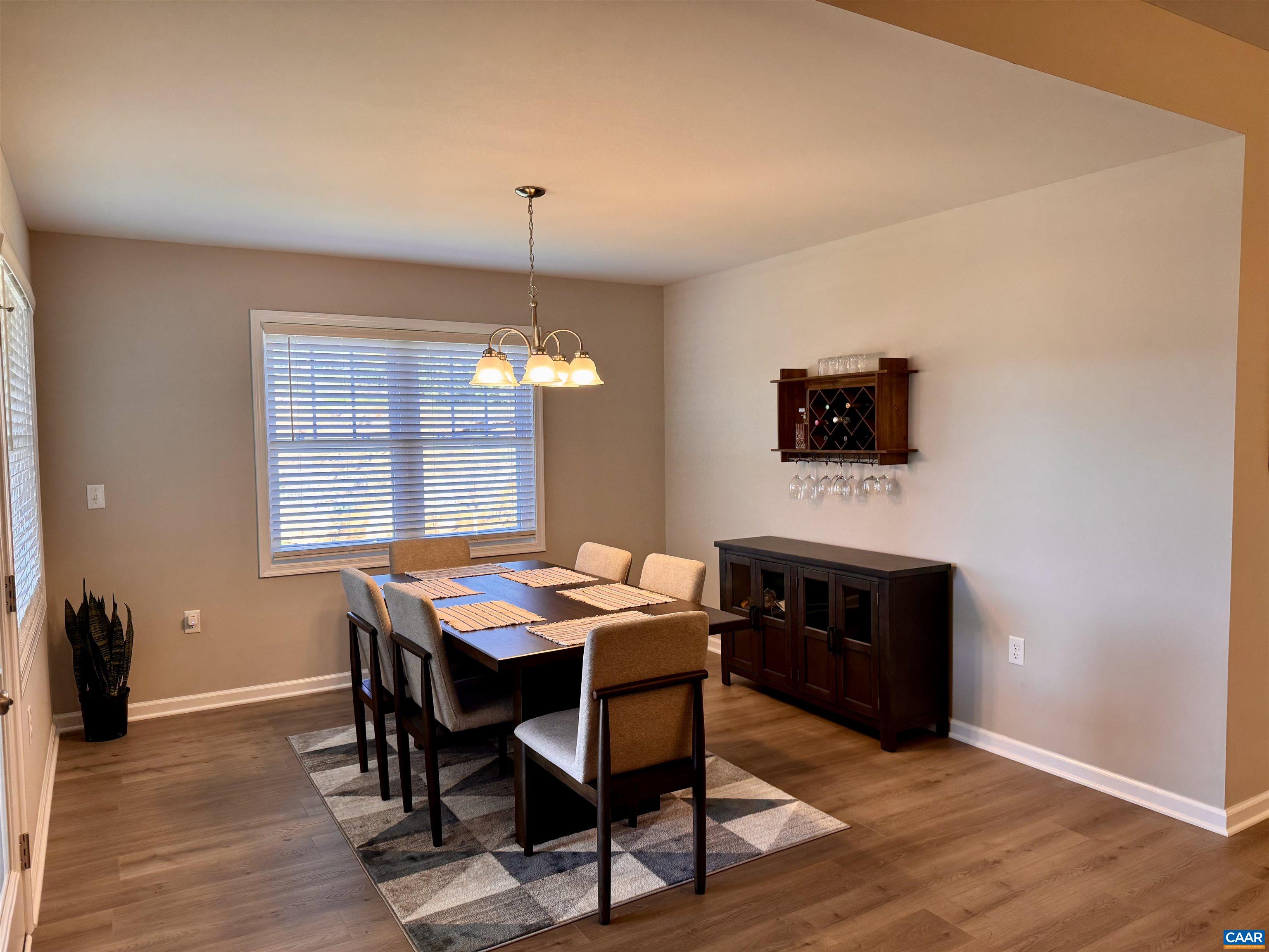 201 Spring Run Lane Waynesboro, VA 22980 - Photo 14 of 29 a view of a dining room with furniture window and wooden floor