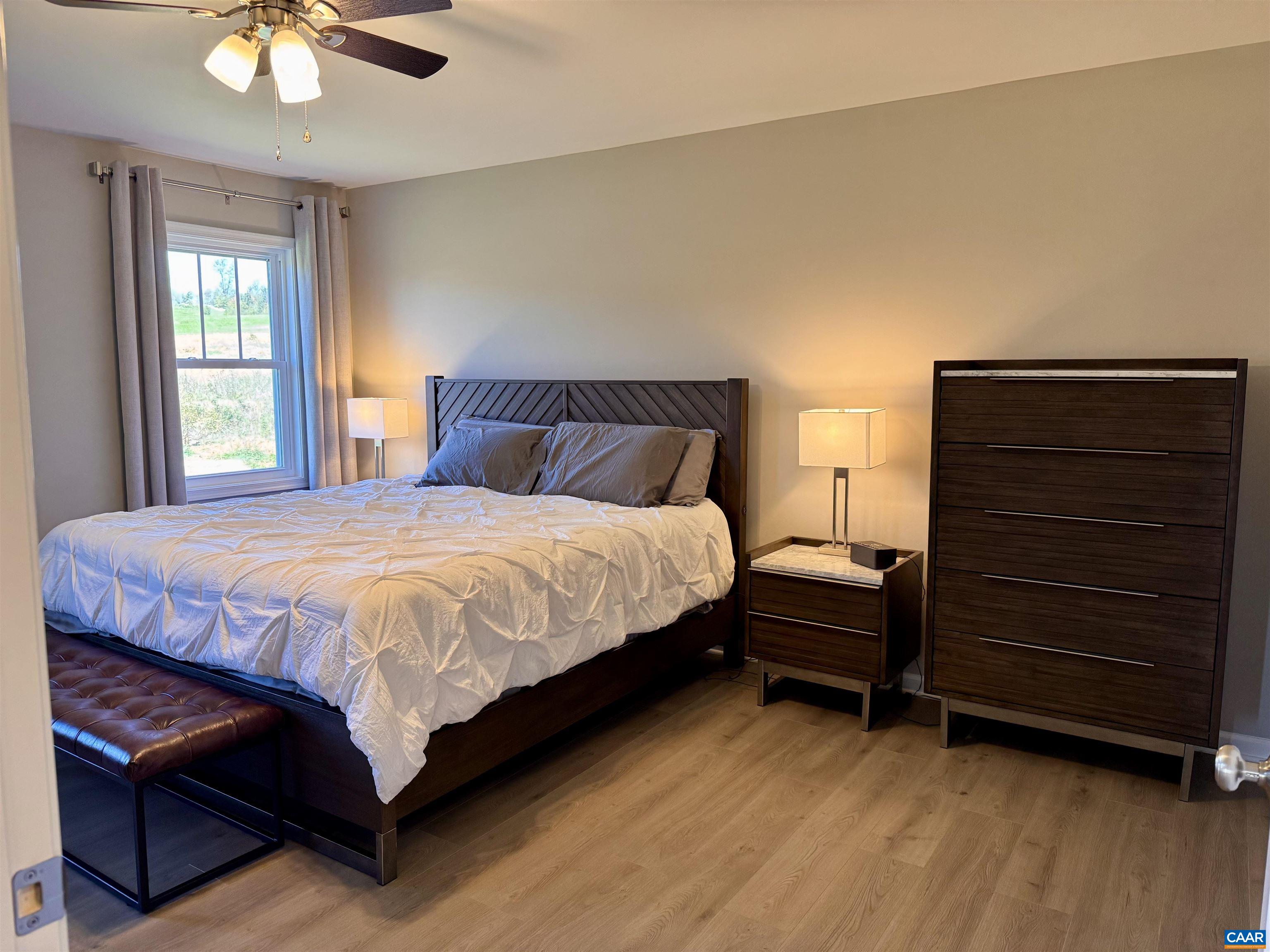 201 Spring Run Lane Waynesboro, VA 22980 - Photo 15 of 29 a bedroom with a bed and a dresser