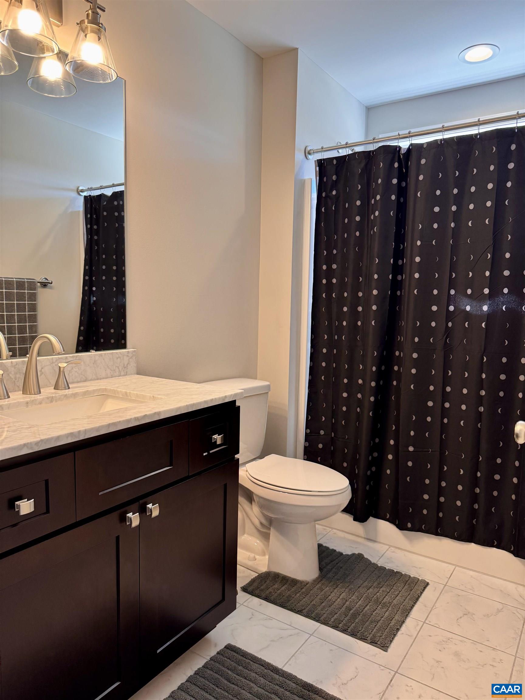 201 Spring Run Lane Waynesboro, VA 22980 - Photo 22 of 29 a bathroom with a sink toilet and shower