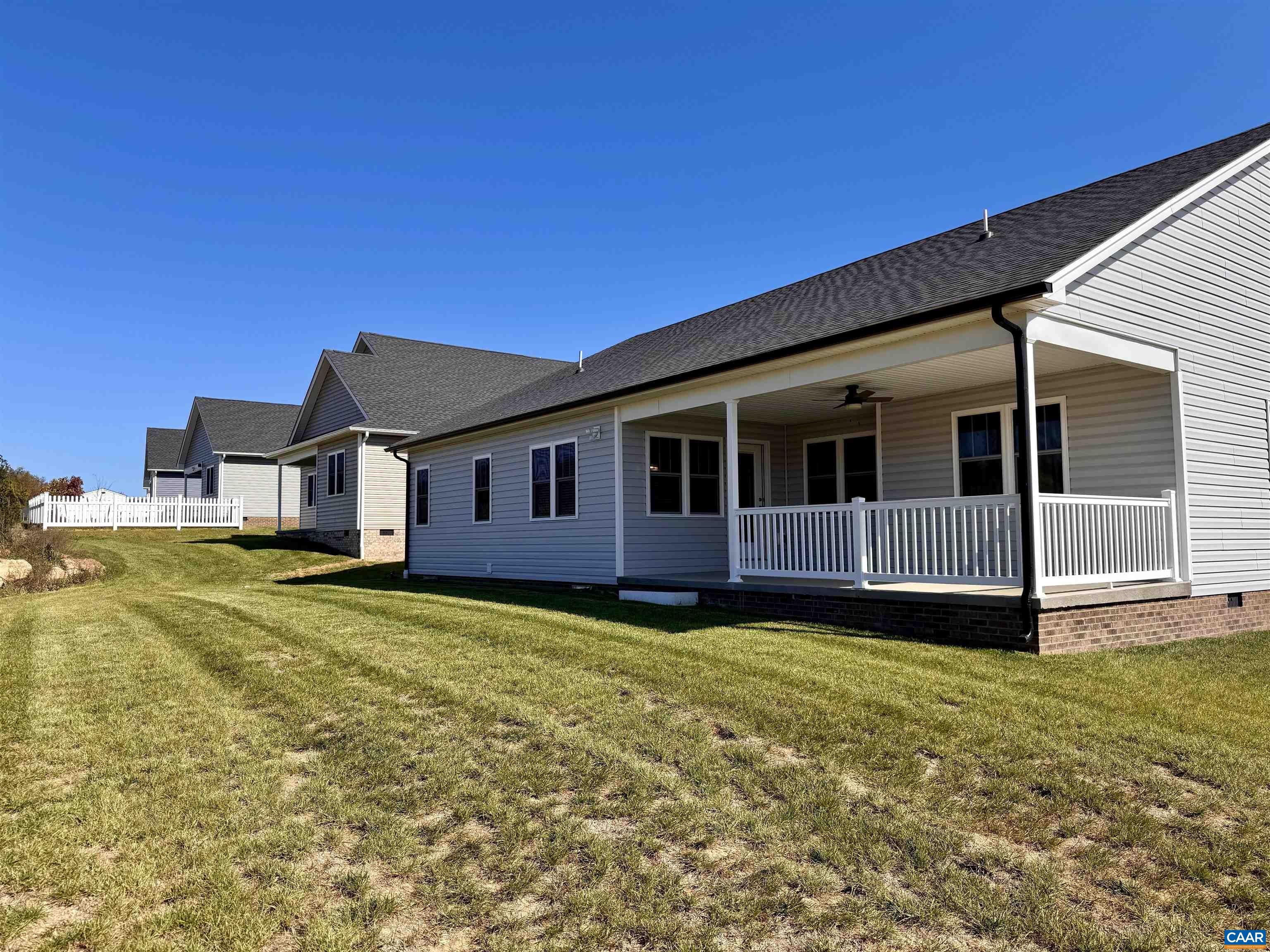 201 Spring Run Lane Waynesboro, VA 22980 - Photo 29 of 29 a backyard of a house with yard table and chairs