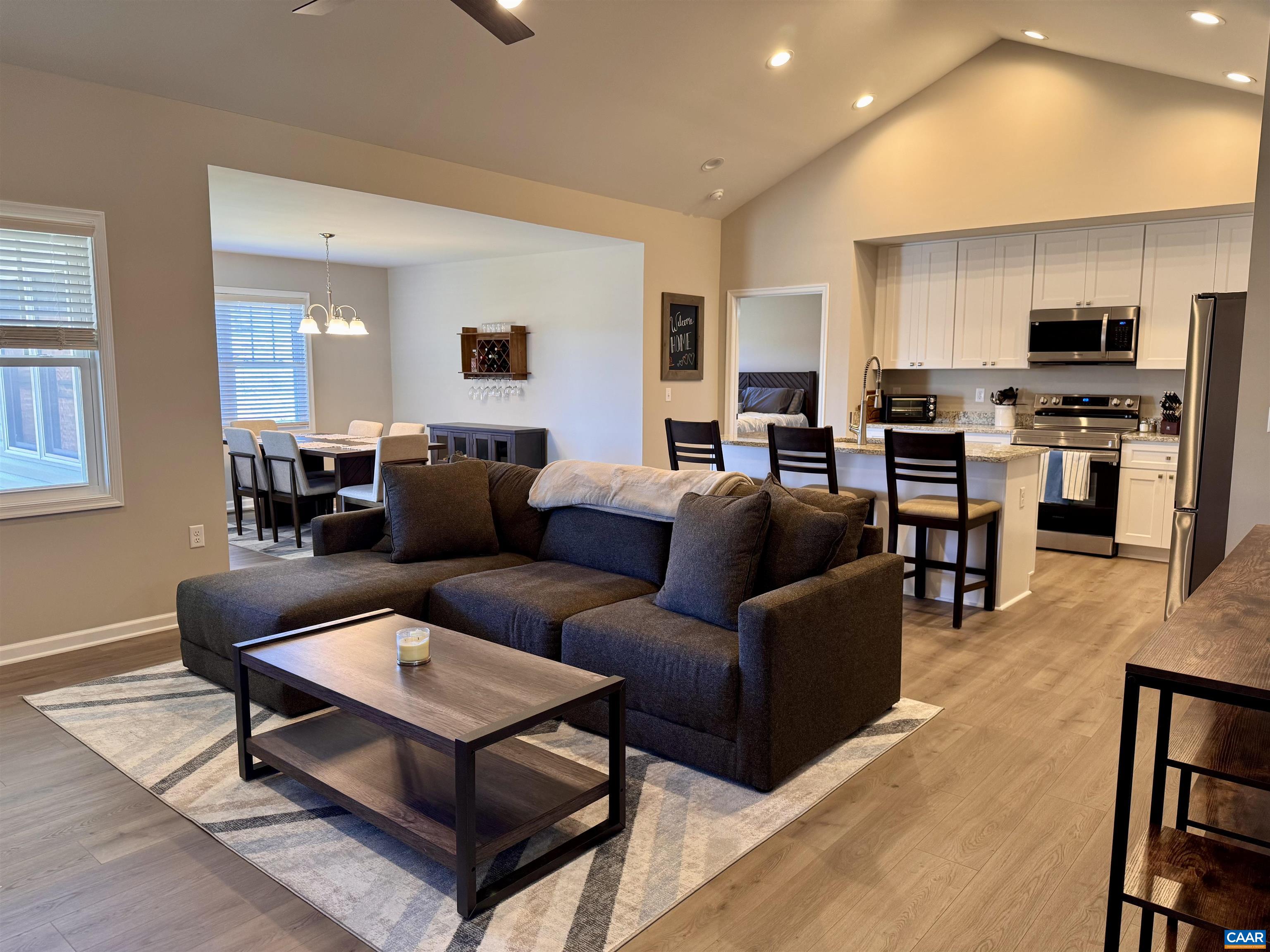 201 Spring Run Lane Waynesboro, VA 22980 - Photo 6 of 29 a living room with furniture a flat screen tv and a table