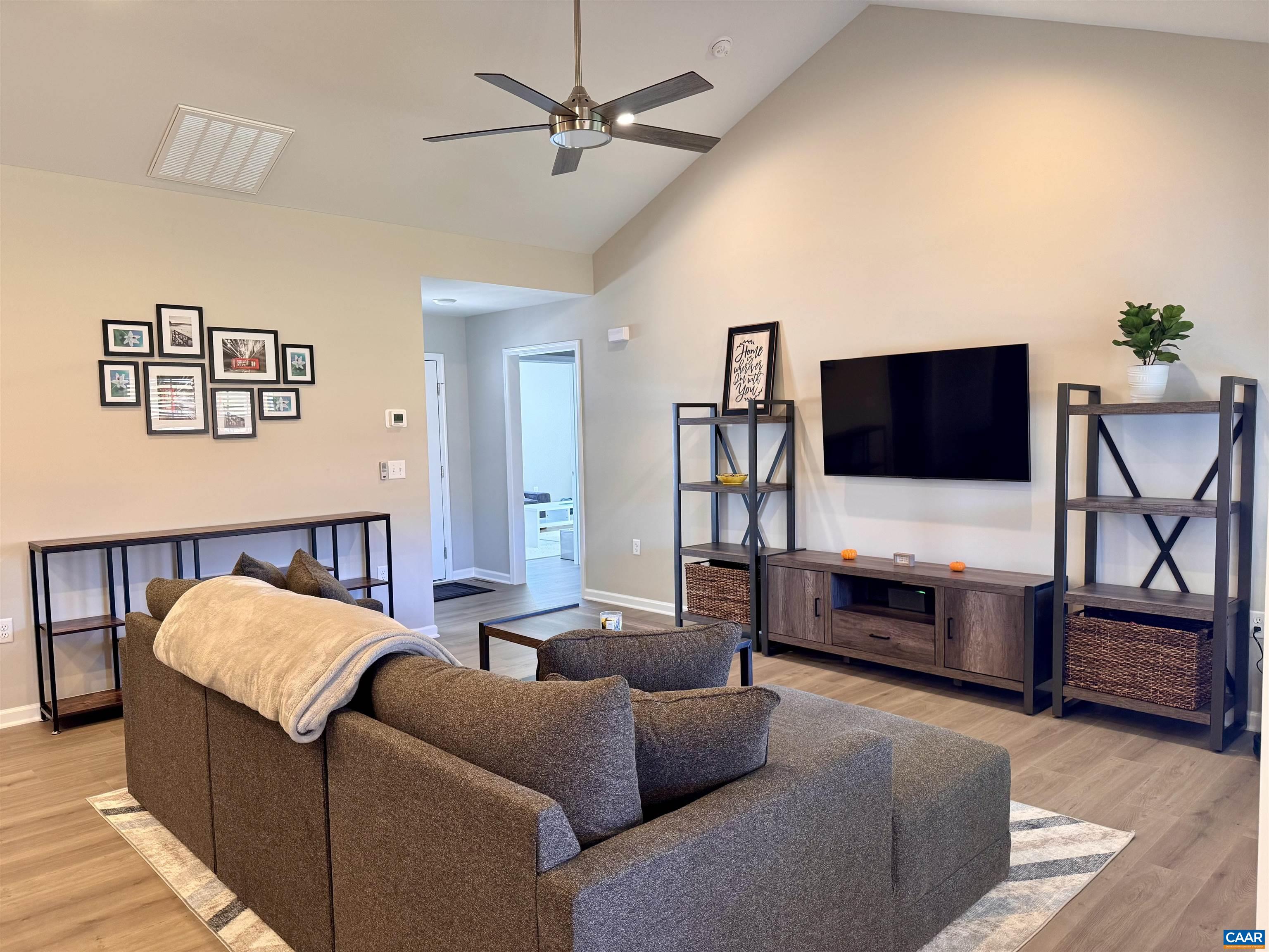 201 Spring Run Lane Waynesboro, VA 22980 - Photo 7 of 29 a living room with furniture and a flat screen tv