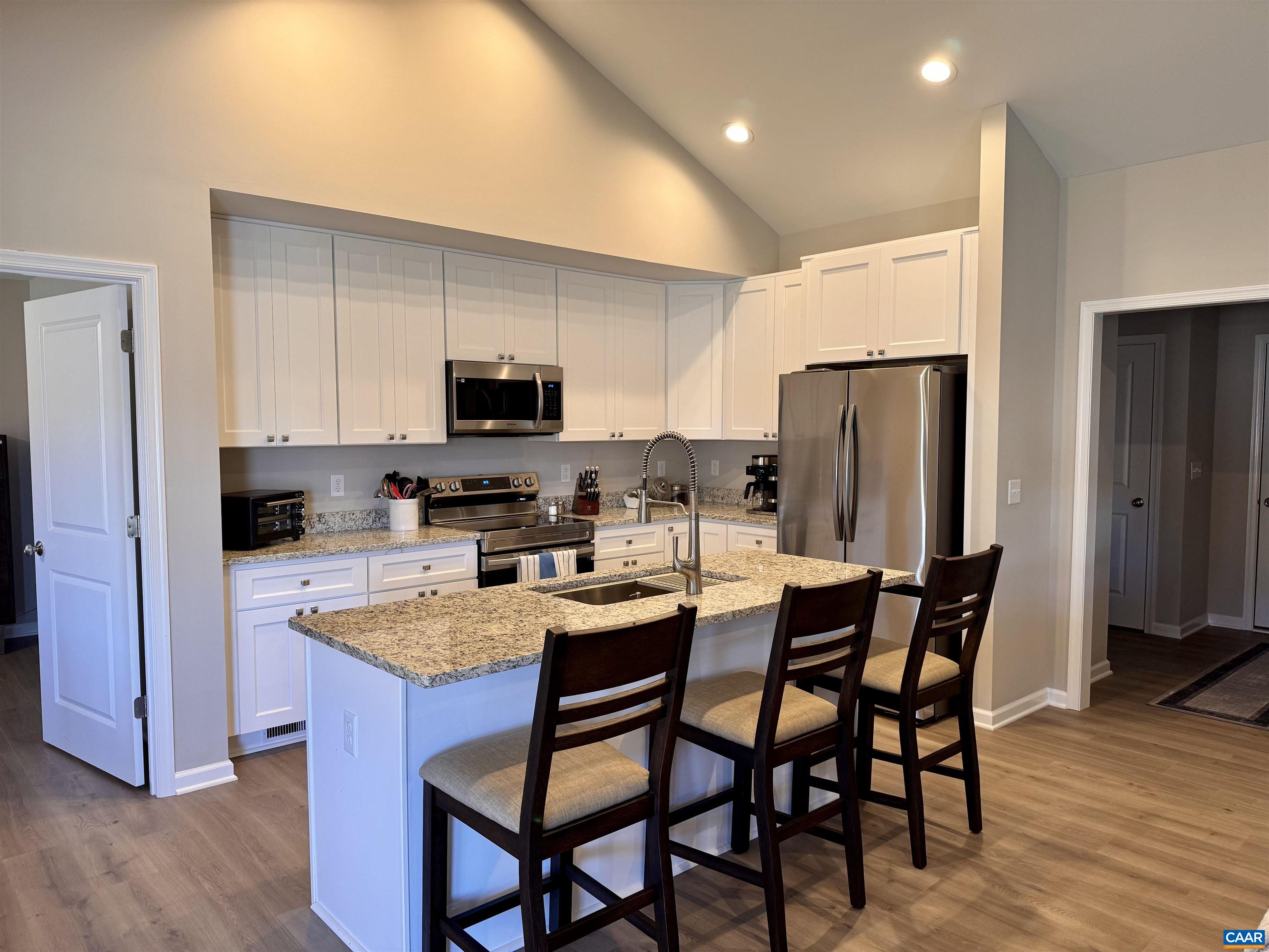 201 Spring Run Lane Waynesboro, VA 22980 - Photo 10 of 29 a kitchen with a dining table and chairs