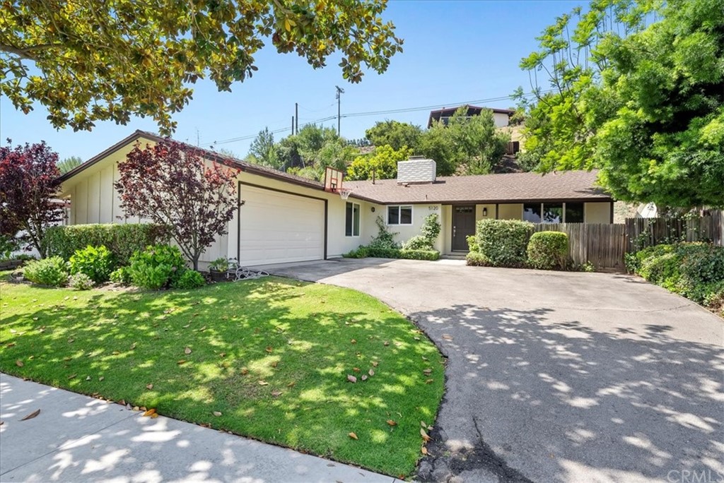 5120 Kingspine Road Rolling Hills Estates, CA 90274 - Photo 1 of 1 a front view of a house with a yard