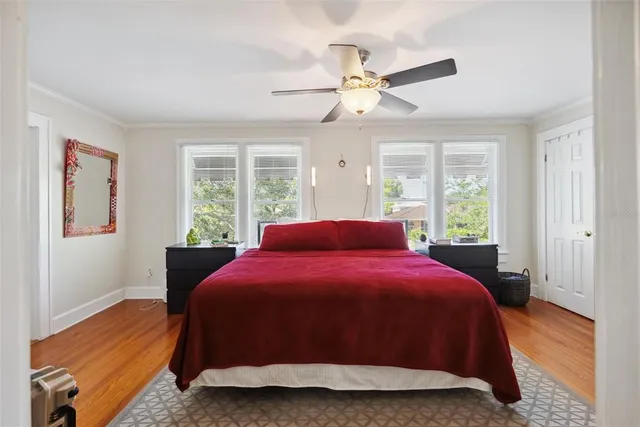 a bathroom with a sink toilet vanity and shower