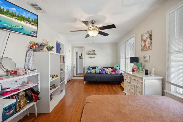 a view of a chairs and table in the patio