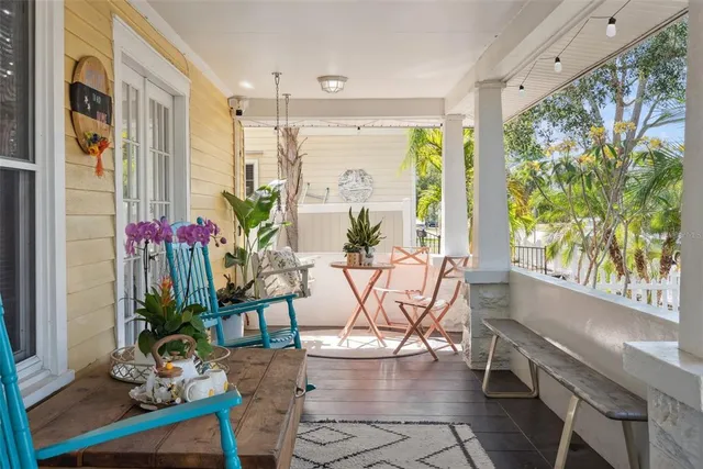 a view of a livingroom with furniture and a flat screen tv