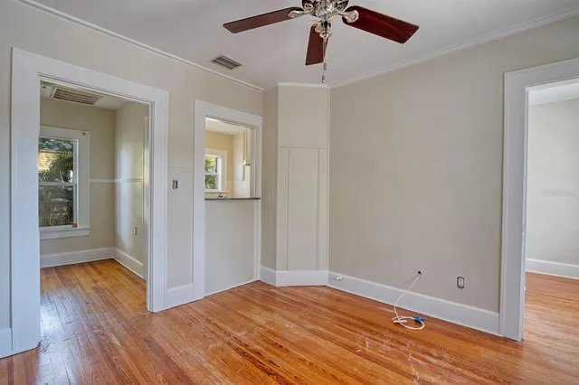 a kitchen with stainless steel appliances granite countertop a refrigerator and a stove