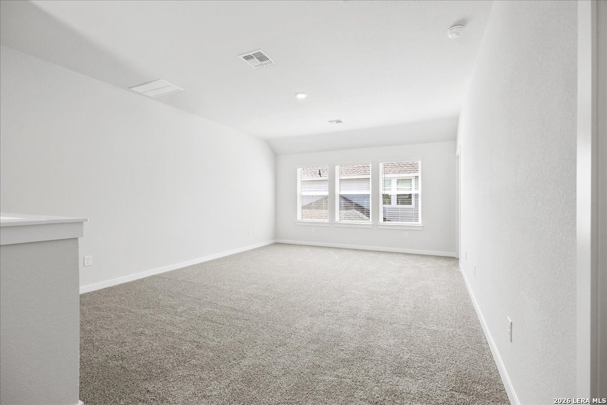 142 Stream Street Seguin, TX 78155 - Photo 13 of 20 an empty room with windows