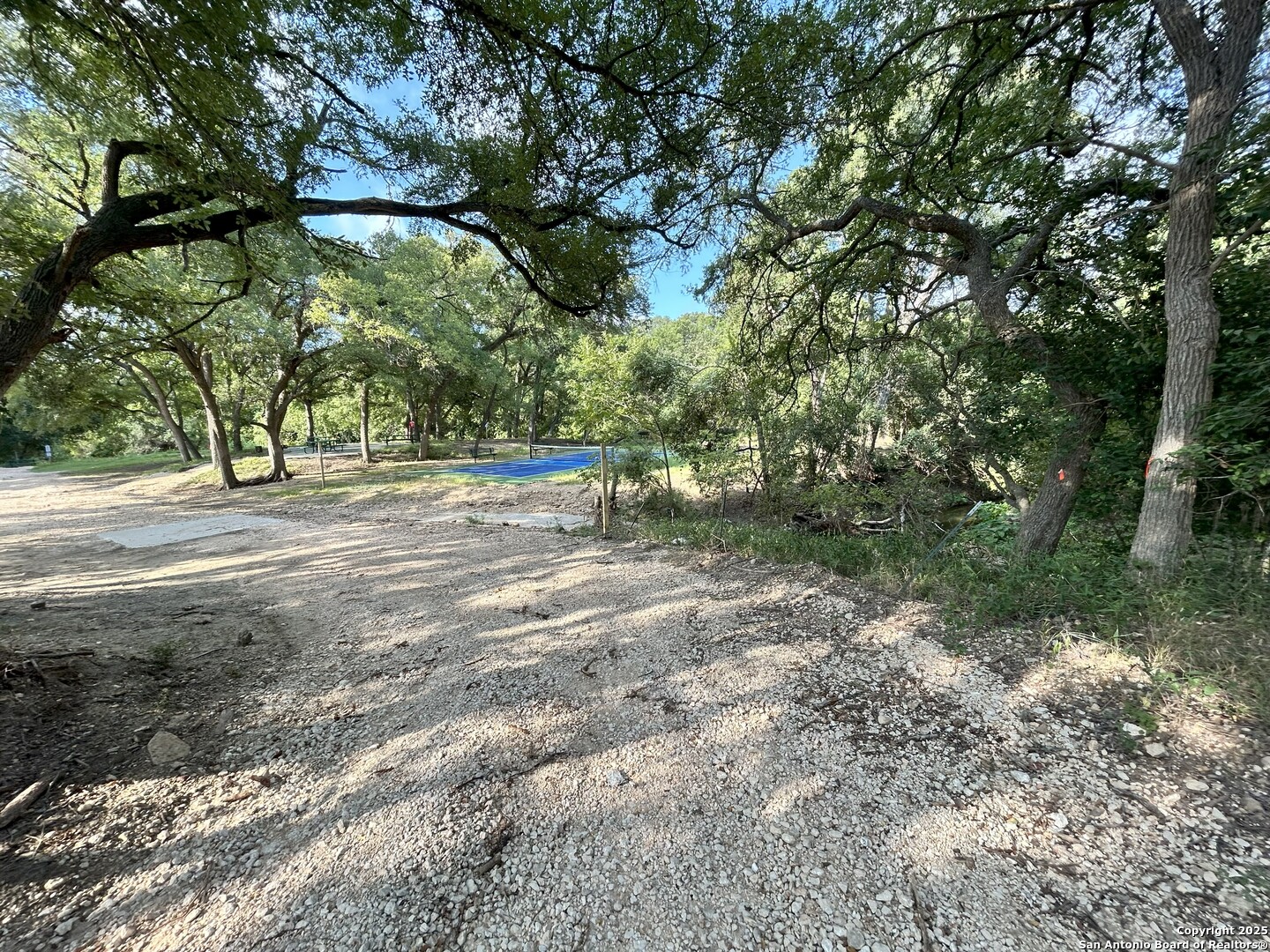 142 Stream Street Seguin, TX 78155 - Photo 20 of 20 a view of outdoor space with deck and tree