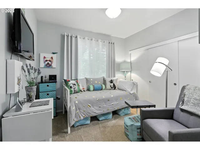 a bathroom with a granite countertop sink mirror and double