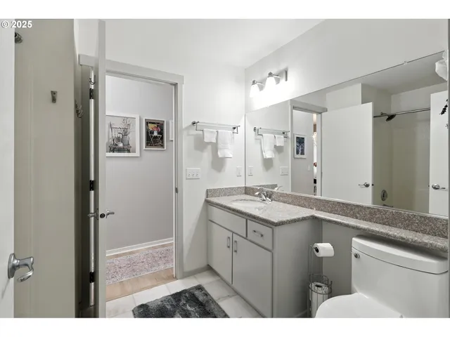 a bathroom with a shower and a shower