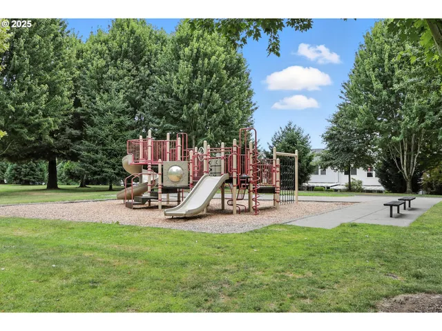 a living room with a couch and a fireplace