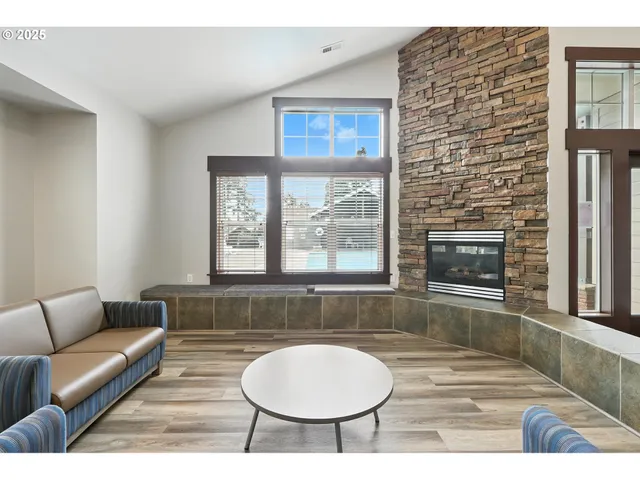 a view of swimming pool with outdoor seating