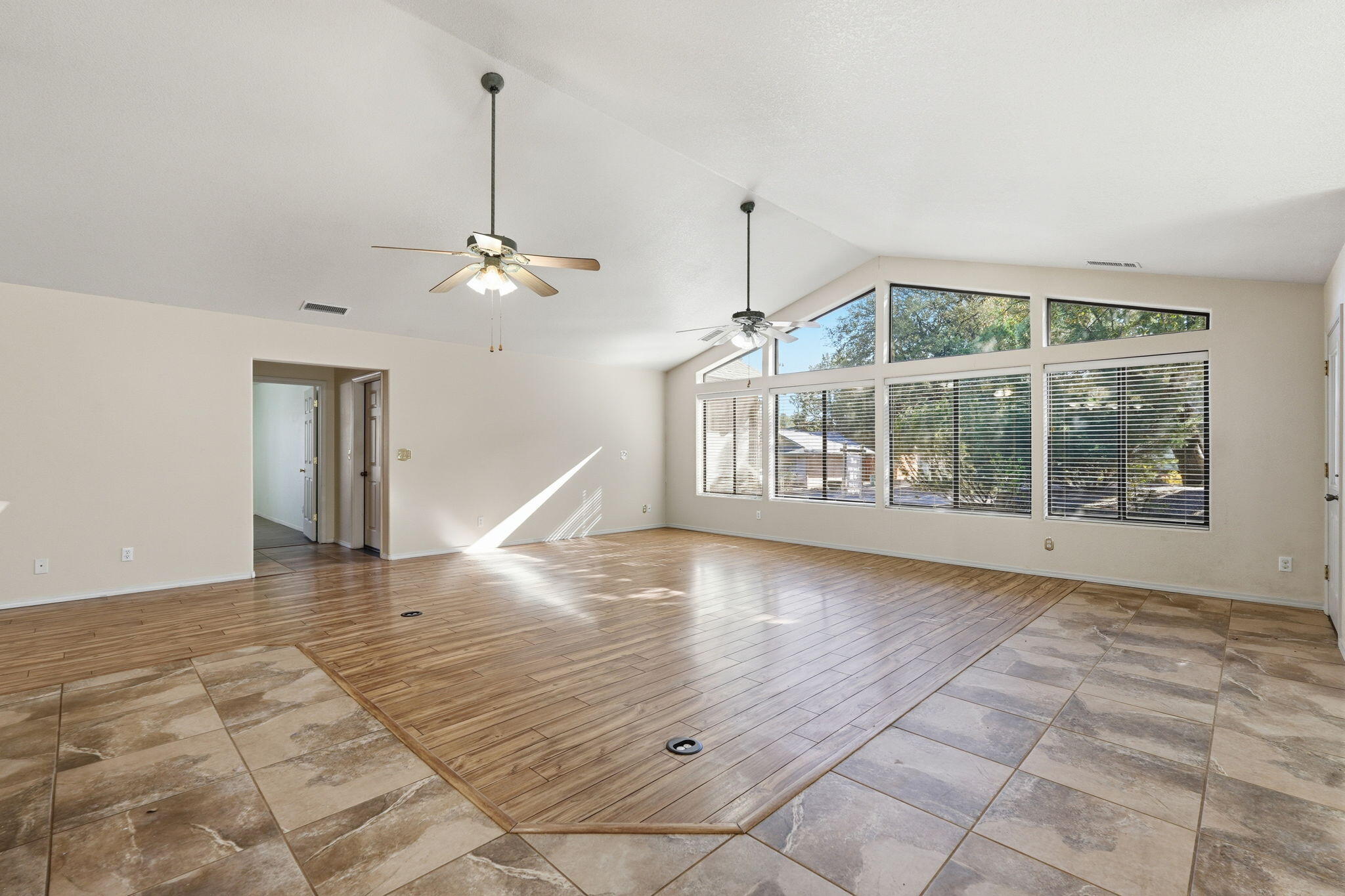 310 North Trailwood Road Payson, AZ 85541 - Photo 10 of 55 a view of empty room with wooden floor and fan