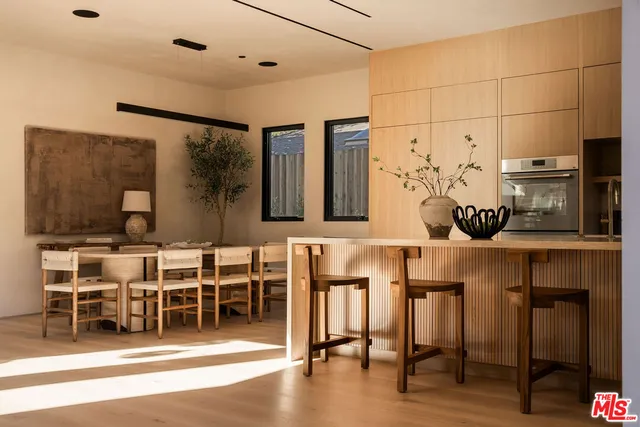 a view of a chairs and table in a room