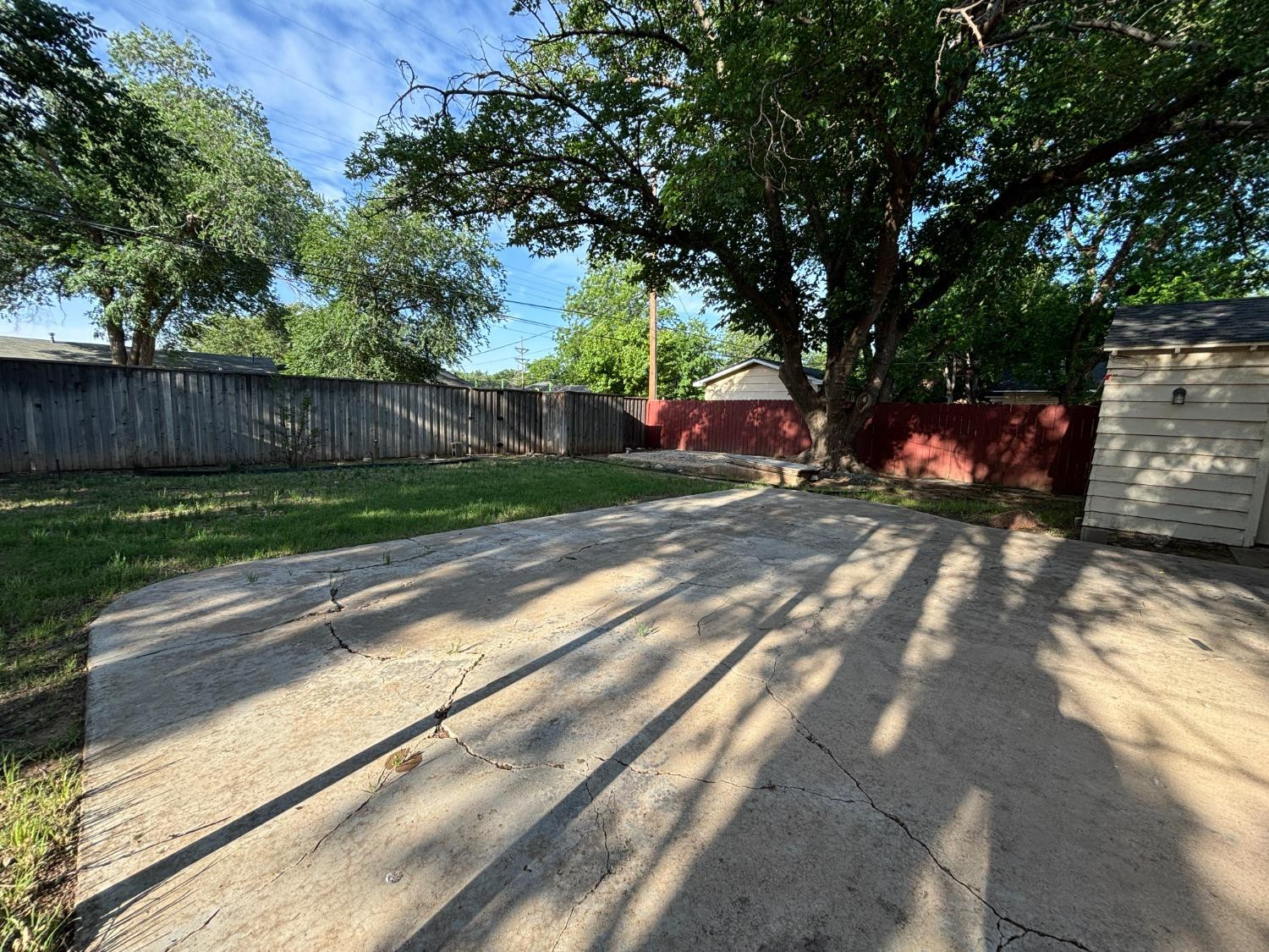 2825 24th Street Lubbock, TX 79410 - Photo 15 of 16 a view of a yard with plants and a trees
