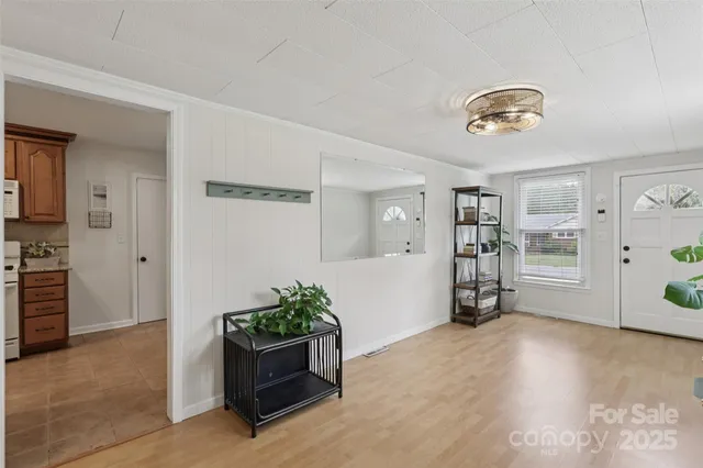 a view of an empty room with a window