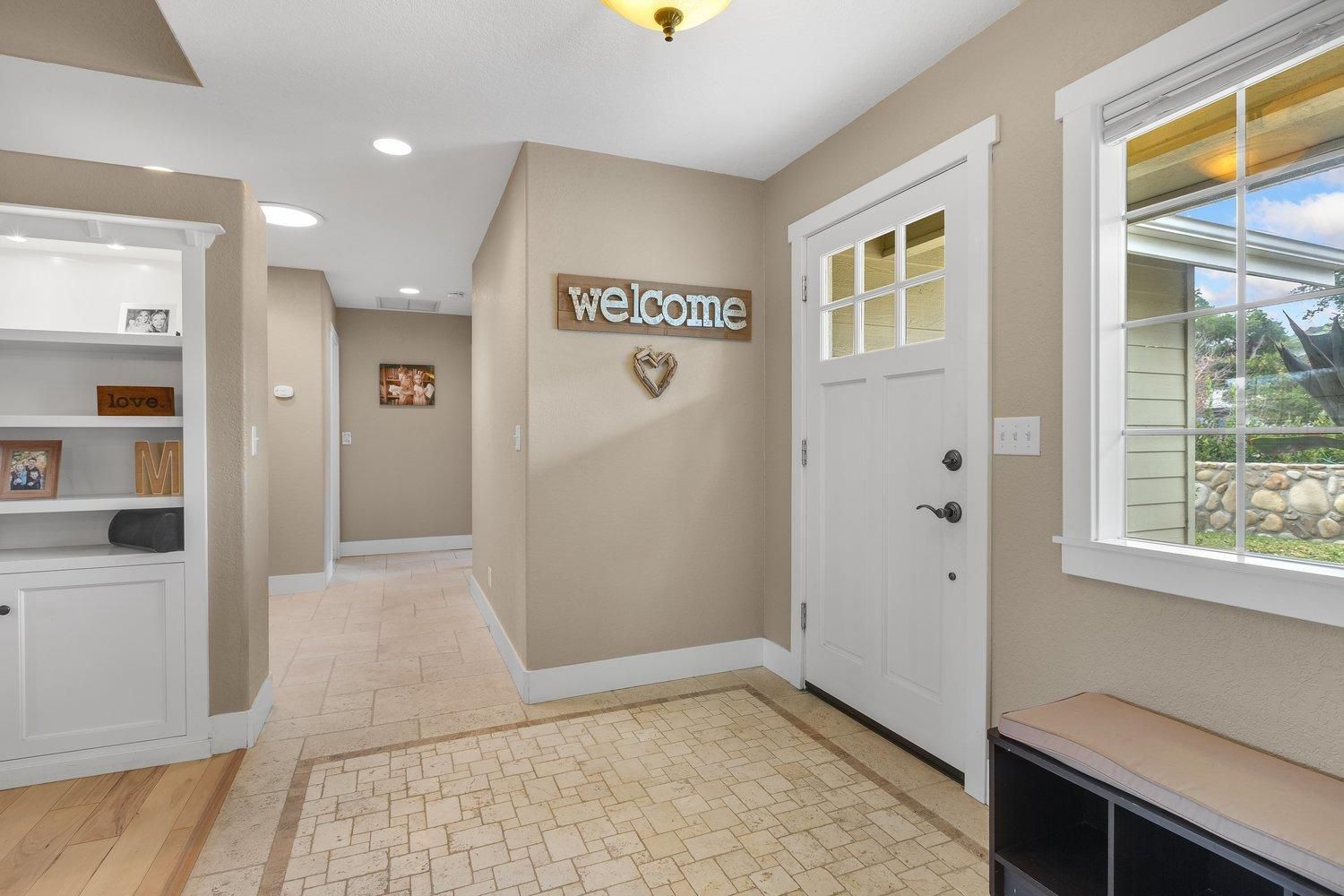 570 Burnham Road Oak View, CA 93022 - Photo 3 of 17 a view of an entryway with wooden floor and windows