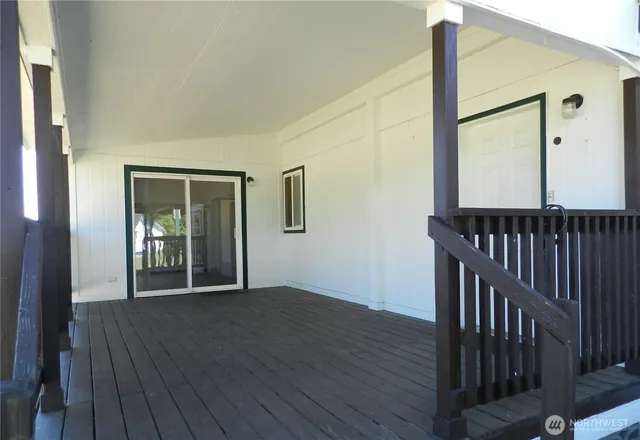 a kitchen with a sink cabinets and window