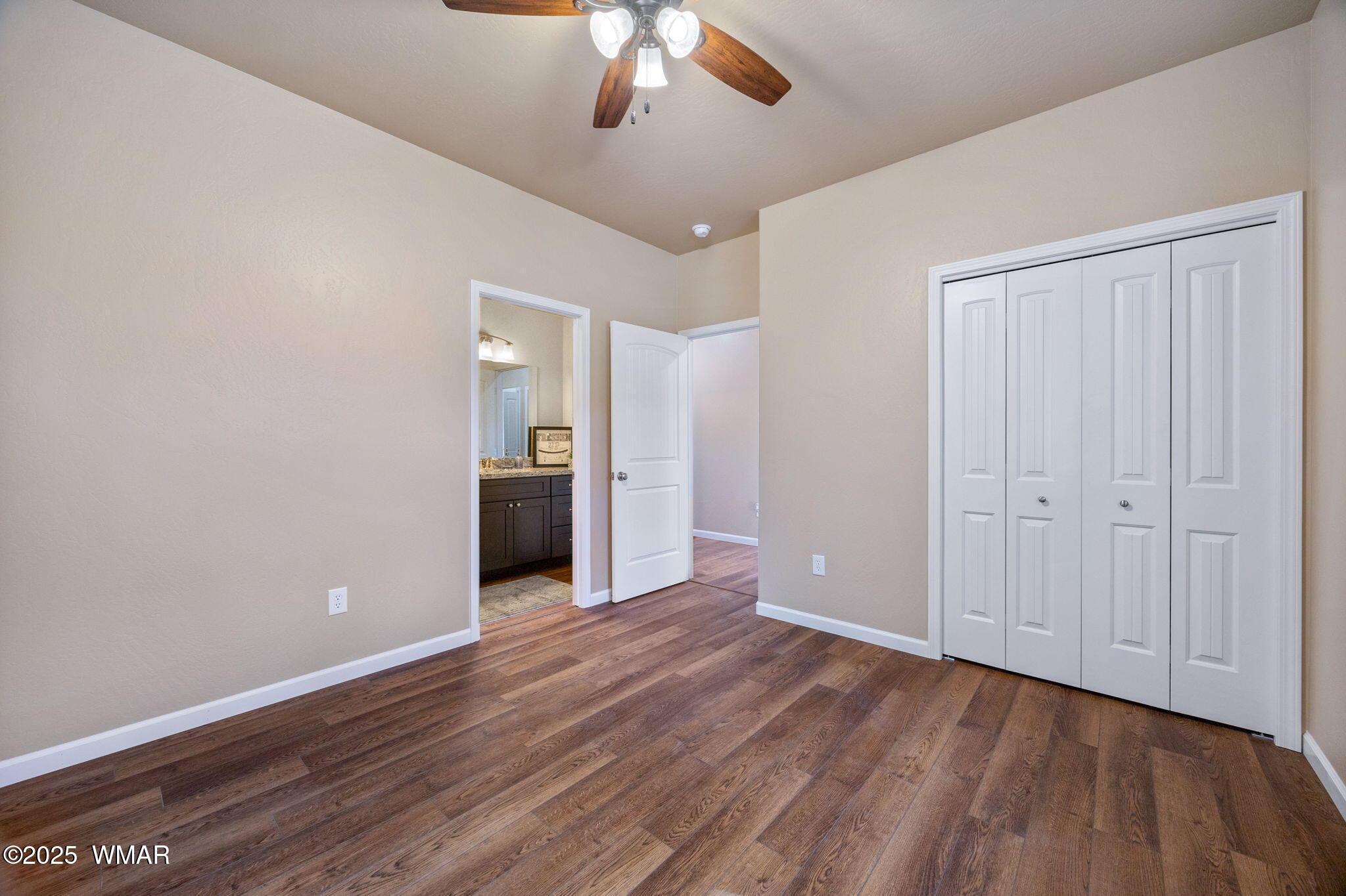 5523 Turkey Run Road Pinedale, AZ 85934 - Photo 18 of 34 wooden floor in an empty room with a window