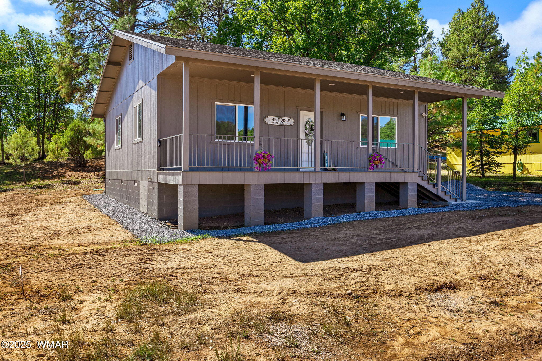 5523 Turkey Run Road Pinedale, AZ 85934 - Photo 28 of 34 a view of house with backyard and seating space