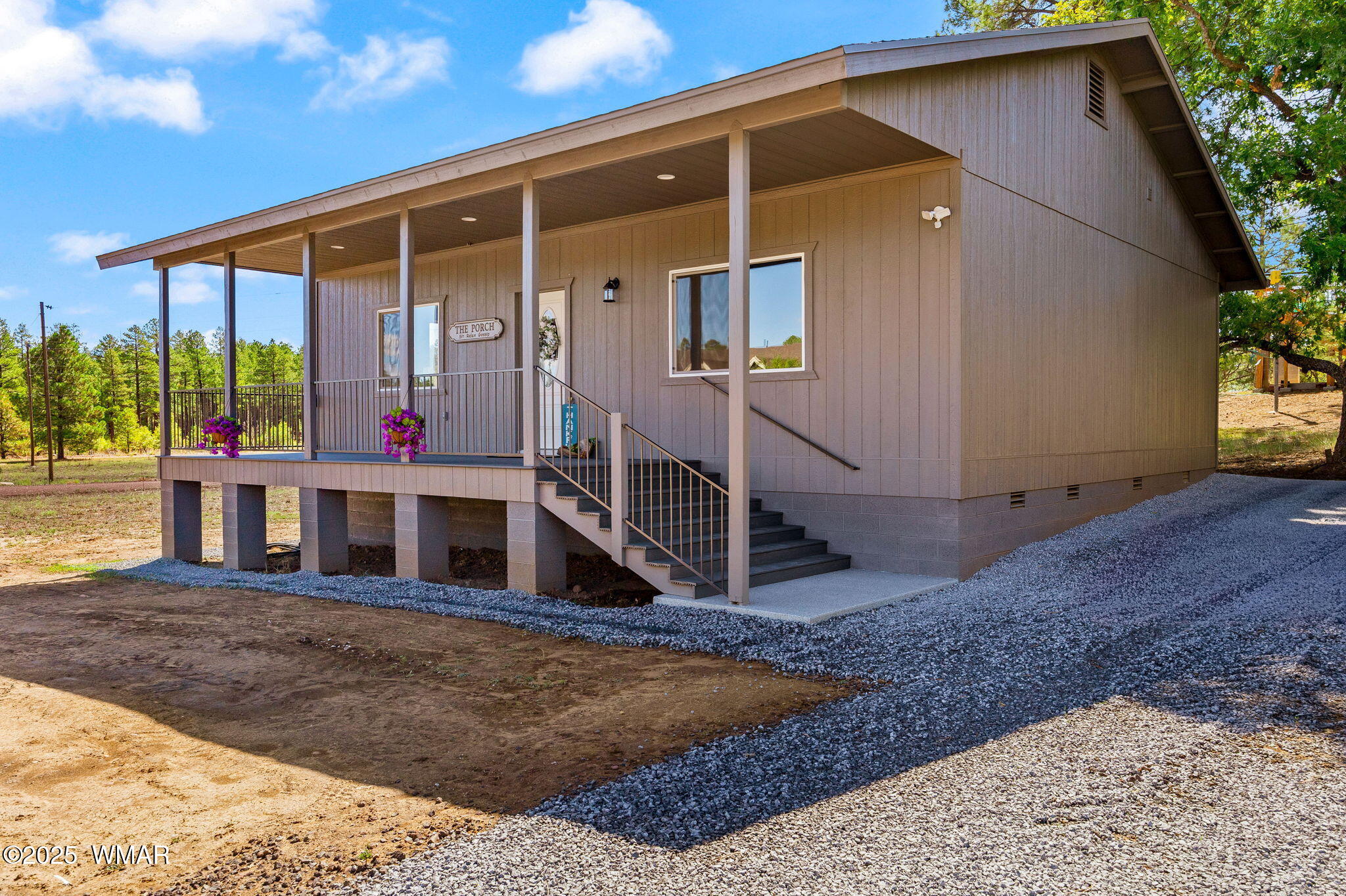 5523 Turkey Run Road Pinedale, AZ 85934 - Photo 29 of 34 a view of a house with a backyard